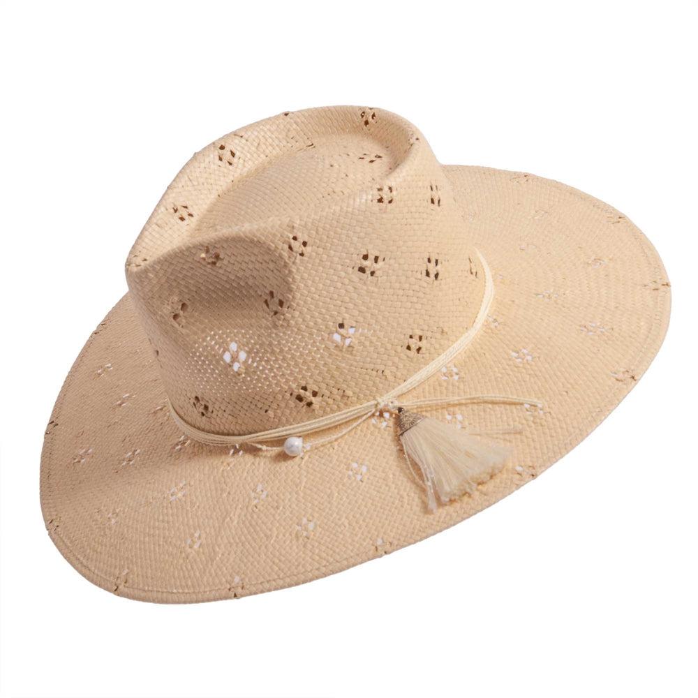 An angled view of Lena natural straw sun hat