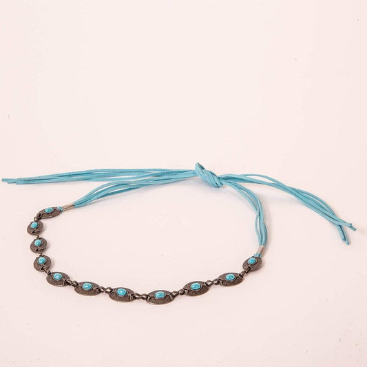 An angle view of Nizhoni Turquoise Hat Band