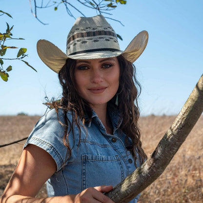 A woman wearing Cream Wide Brim Straw Hat