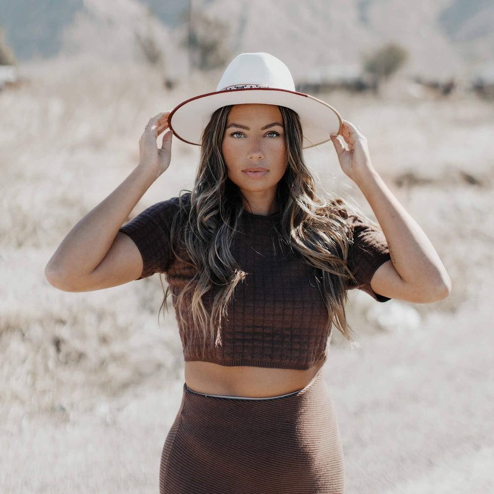 A woman in black tops wearing Fazenda Wide Brim Felt Fedora Hat