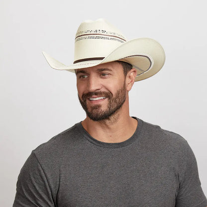 Man wearing a Ponderosa cowboy hat and a charcoal gray t-shirt