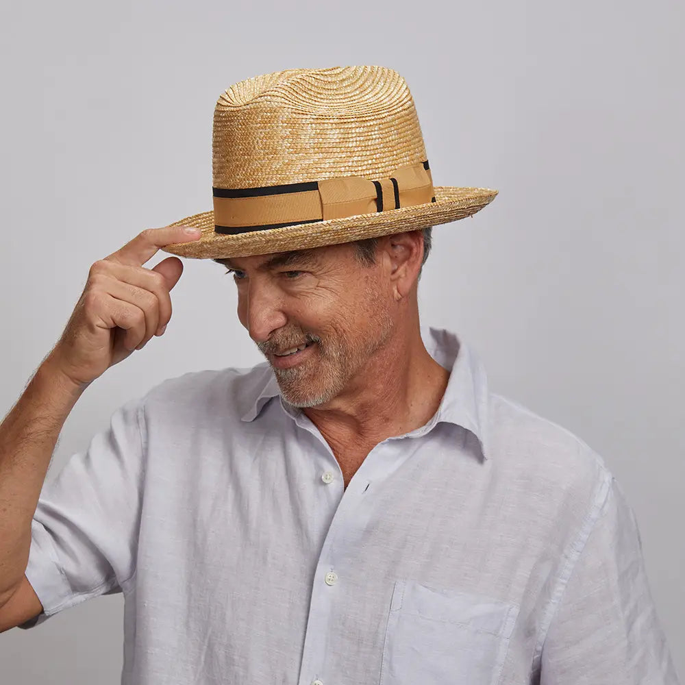 Man tipping his Sawyer Sun Hat slightly