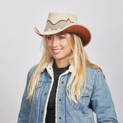 Smiling woman with blonde hair wearing a denim jacket and the Sierra Latte Cowboy Hat