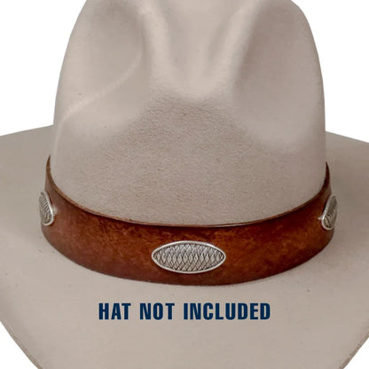 A close-up of a light beige cowboy hat with a brown leather band and silver conchos, overlaid with the text 'HAT NOT INCLUDED' in blue at the bottom.
