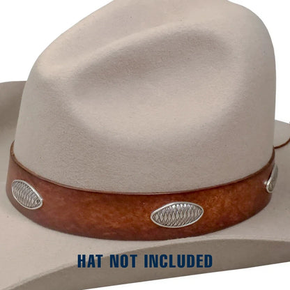 Close-up of a light beige cowboy hat with a brown band and silver conchos, with the text 'HAT NOT INCLUDED' overlaid at the bottom.