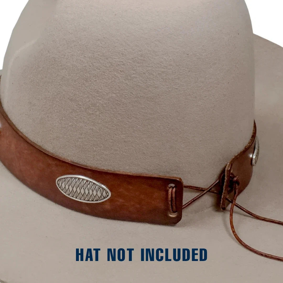 A close-up of a light beige felt hat with a brown leather chin strap and silver oval metal detail, on a white background with the text 'HAT NOT INCLUDED' at the bottom.