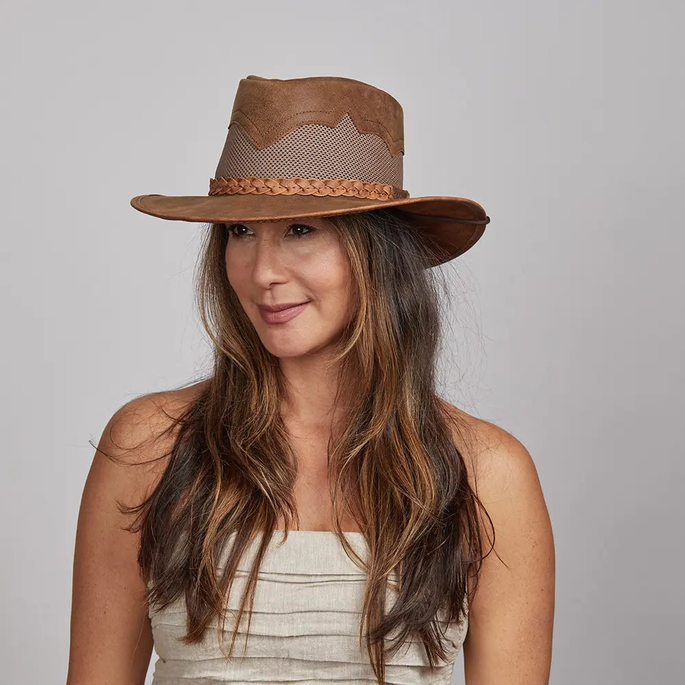 A woman with a dark hair wearing the Sirocco Copper Outback Hat