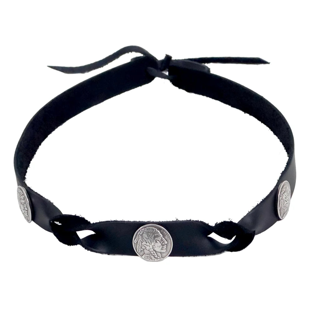 A black faux-leather headband with three silver coin-style metal studs featuring Native American head profiles, shown against a plain white background.