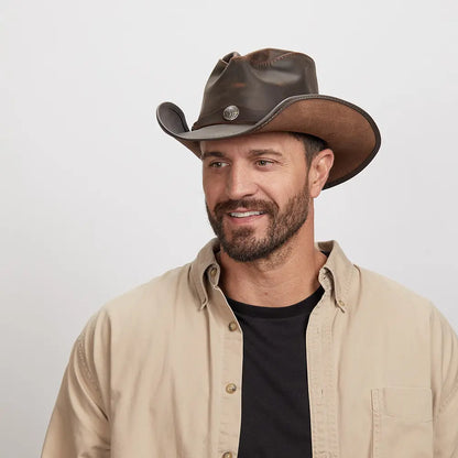 A man in a brown polo wearing the Western Chocolate Leather Cowboy Hat