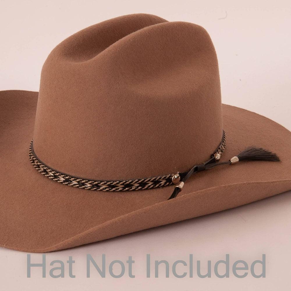 A side view of a Bodie Black Hat Band on a brown felt hat