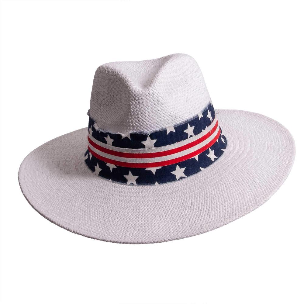 A front view of Knox white straw sun hat with US flag designed hat band